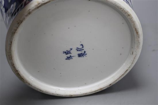 A 19th century Chinese blue and white jar, with panelled decoration, height 28cm and an associated vase lid